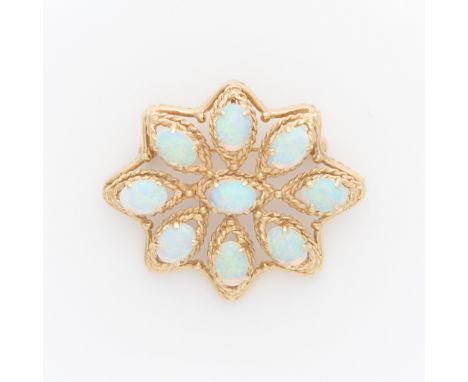 14k yellow gold floral form brooch set with nine oval cabochon jelly opals. The setting formed by delicate twisted rope detai