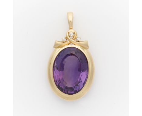 14k yellow gold pendant set with large bezel set oval amethyst. the amethyst a deep purple color, approximately 37 ct. With r