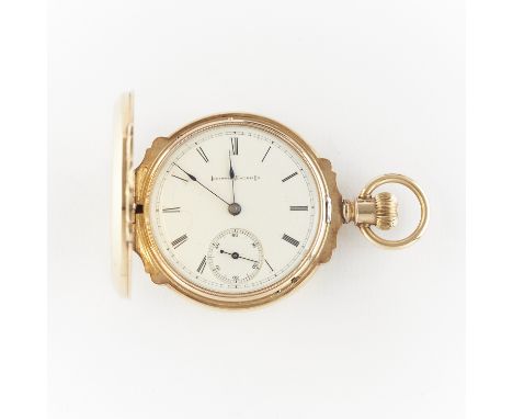 Illinois Watch Company, United States. 14k yellow gold pocket watch in hunter case with engraved foliate and floral details, 