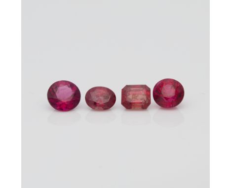 Group of four red/pink sapphires including two round cuts, one oval and one step cut, weighing 2.20 ctw.Length ranges from 4.