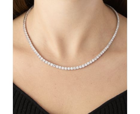 Platinum and diamond tennis necklace. Set with 136 round brilliant cut diamonds, graduating in size, of G to H color, SI1-I1 