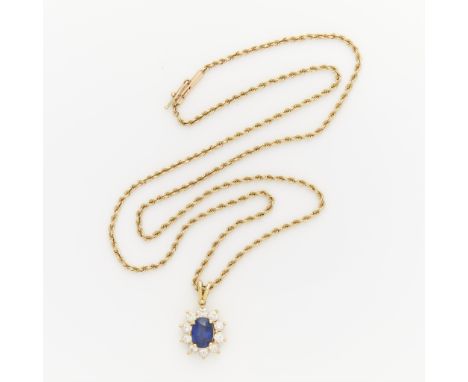 18k yellow gold sapphire &amp; diamond pendant on a 14k yellow gold chain. 14k yellow gold rope chain with barrel clasp closu