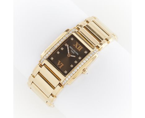 18k rose gold &amp; diamond set Patek Philippe Twenty-4 4910/11R-010 with original box and papers. The watch with a chocolate