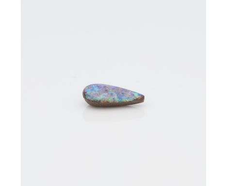 One 1.55 carat pear shaped cabochon boulder opal.Length: 11.93 mm x width: 6.29 mm x depth: 3.38 mm. Gross weight: 1.55 ct.Co