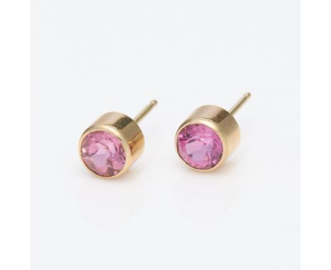 14k yellow gold bezel set pink tourmaline studs. Marked 14k and unidentified marker's mark at post. Without backs.Each, diame