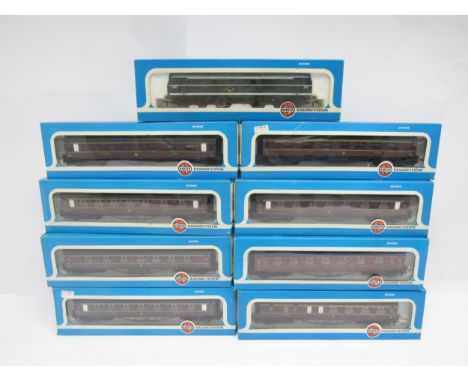 A boxed Airfix Railway System 00 gauge 54101-9 A1A-A1A Class 31/1 diesel locomotive in BR green livery and eight boxed compos