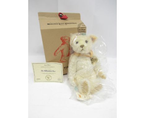 A Steiff for Danbury Mint 'Millenium' light blonde mohair teddy bear with gold coloured button and yellow tag to ear, wearing