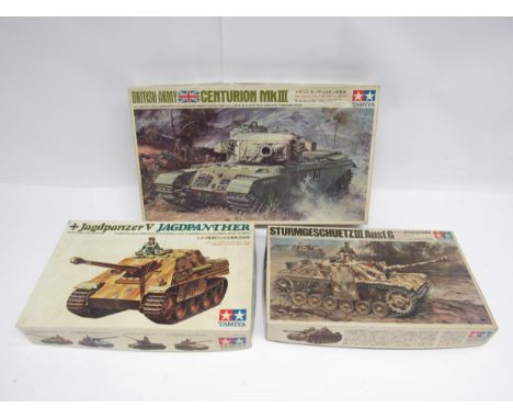 Three Tamiya 1:35 scale military vehicle plastic model kits to include Jagdpanzer V German Army Tank Destroyer, Sturmgeschuet