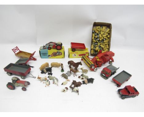 A boxed Corgi Toys 53 Massey-Ferguson 65 Tractor with Shovel and Dinky Toys 319 Weeks Farm Tipping Trailer, and eight loose p