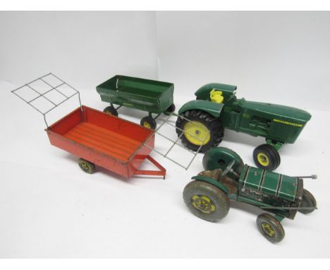 A playworn Mettoy tinplate clockwork tractor and trailer and an ERTL diecast John Deere tractor and pressed steel trailer (4)