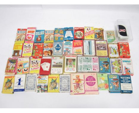 A collection of card games and playing cards including Old Maid, Top Trumps, Donkey, Snap, Animal Rummy etc.