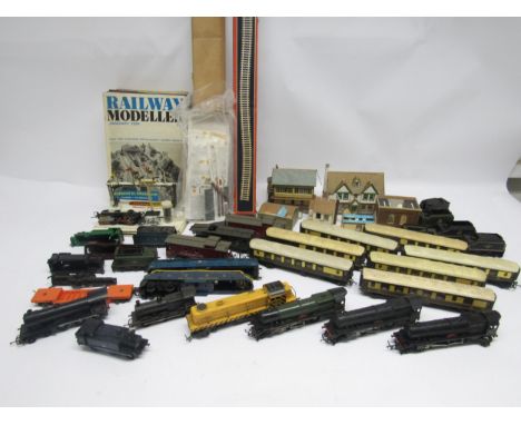 Seven loose and playworn Triang 00 gauge model railway locomotives and assorted 00 gauge rolling stock, spares, trackside bui