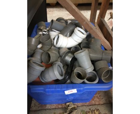 A BOX OF PLASTIC PIPE FITTINGS