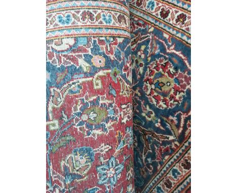 AN ORIENTAL CARPET WIDTH APPROX. 200CM