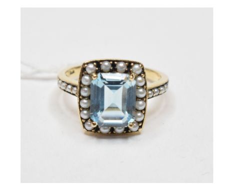 A 9ct gold, emerald cut blue topaz and pearl ring, approx. ring size Q   Condition report  ModernApprox. 3.8 g (all in)