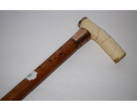 A Victorian sword stick, with a carved ivory handle and 9ct gold collar, inscribed, Chester 1885