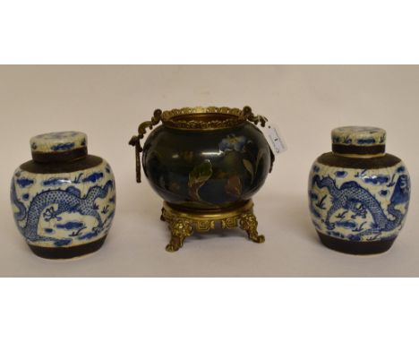 A pair of Chinese porcelain ginger jar and covers, decorated dragons, 15 cm high, and a Japanese jardiniere, with enamel deco