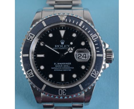 A gentleman's stainless steel Rolex Submariner wristwatch, serial number U154794, reference RAF16610, having a black dial, an