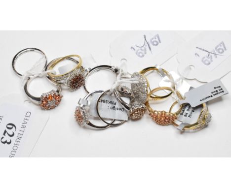 A 9ct white gold and diamond dress ring, approx. ring size R½, and ten similar 9ct white and yellow gold dress rings, with te