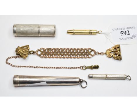 A yellow coloured metal propelling pencil, with engine turned decoration, boxed, a cheroot holder, a pinchbeck chain with a s
