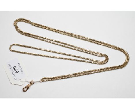 A 9ct gold long guard chain, with an associated 9ct gold clasp, approx 29.9 g 