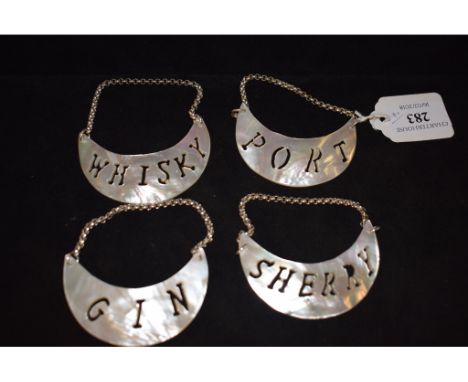 Four mother of pearl decanter labels, GIN, PORT, SHERRY and WHISKY (4)
