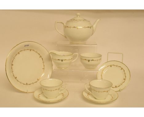 A Royal Worcester Chantilly pattern tea service, for eight place settings, including a teapot and cover, a milk jug and a sug