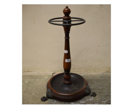 A Victorian style mahogany stick stand, with a turned column, 56 cm high 