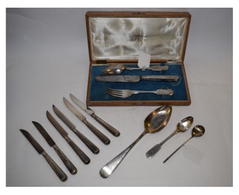 A Russian silver knife and fork and spoon, St Petersburg, cased, three other spoons, a pair of silver and horn salad servers 