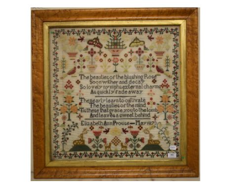 A Victorian sampler, worked flowers, birds, insects and a poem by Elizabeth Ann Prouse, dated May 1873, in a birdseye maple f