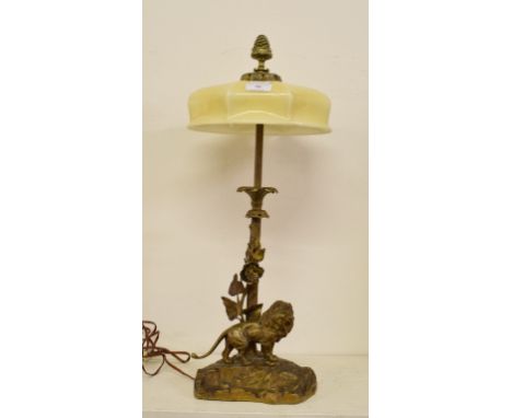 A Continental brass lamp, the base applied a lion, approx. 54 cm high (overall)