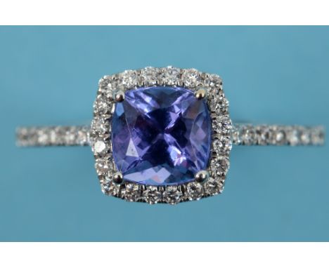 An 18ct white gold tanzanite and diamond ring, approx. ring size M  See inside front cover colour illustration   Condition re