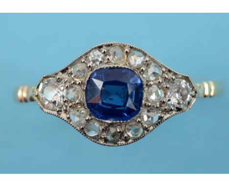 An Art Deco style sapphire and diamond cluster ring, approx. ring size K½  See inside back cover colour illustration   Condit