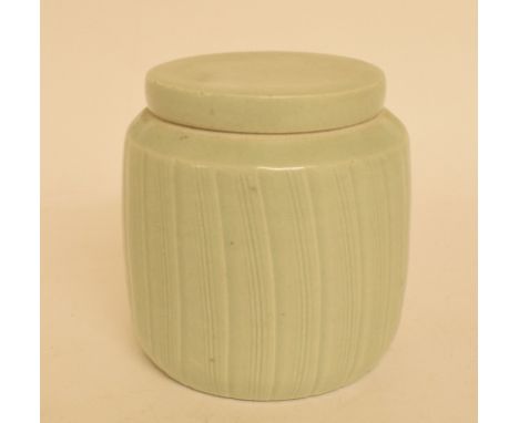 A David Leach for Lowerdown Pottery celadon glazed jar and cover, repaired firing crack to rim, 11 cm high 