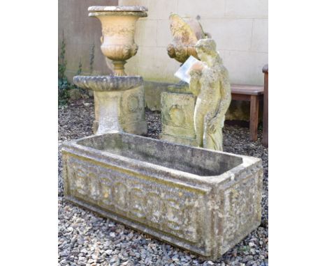 A reconstituted stone garden planter, 91 cm wide, a similar statue, a pair of garden urns, one damaged, and a bird bath (5)