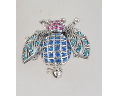 A vintage silver tone rhinestone set bug brooch with roller clasp. Measures 3.5cms.