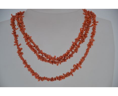 A vintage silver and coral 3 strand choker necklace. The necklace having an ornate hallmarked large spring hook clasp. Measur