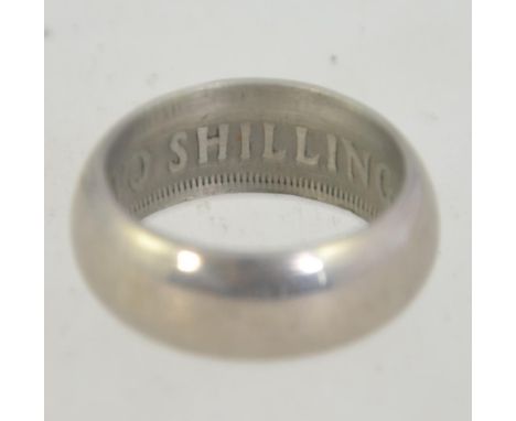 A vintage ring made from a 1950's two shilling coin.