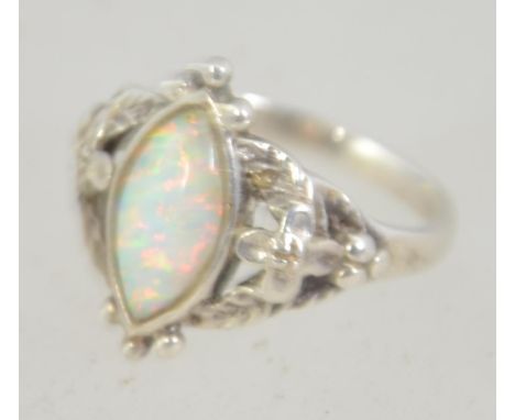 A silver ring set with Etheopean opal stone being marked 925