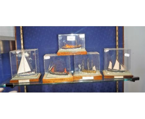A SMALL SCALE MODEL OF HMS VICTORY and similar models each in perspex display boxes (5)