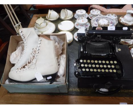 A VINTAGE 'CORONA' TYPEWRITER and a pair of Vintage ice skates