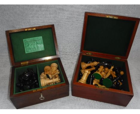 A WEIGHTED STAUNTON CHESS SET in a mahogany box and one other similar Staunton chess set