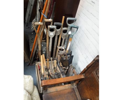 A LARGE COLLECTION OF VINTAGE GARDENING TOOLS, saws, planes and similar items