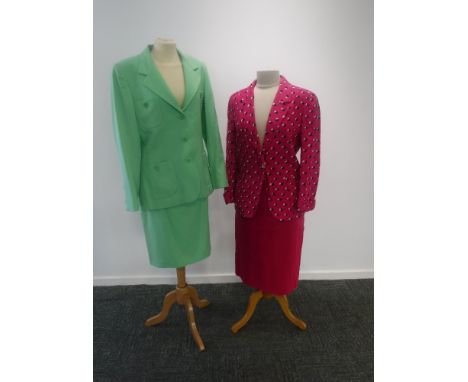 ESCADA: A VINTAGE TWO-PIECE LADIES SKIRT SUIT in mint green and another vintage 'Jaeger' two-piece suit in hot pink, both siz