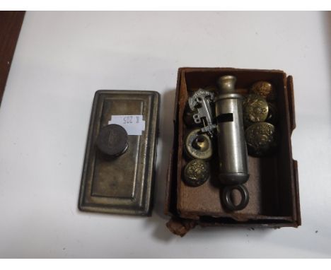 A VINTAGE POLICE WHISTLE, military buttons, a Ford desk weight and other items