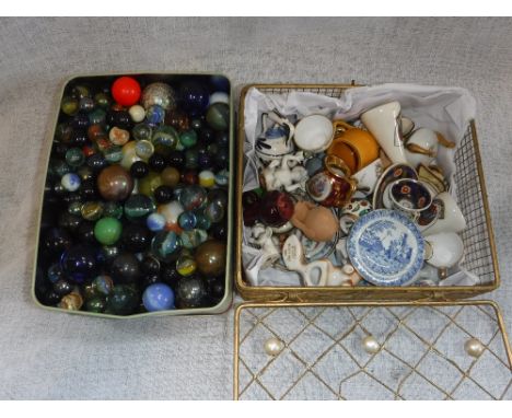 A COLLECTION OF ANTIQUE AND VINTAGE GLASS MARBLES and a selection of miniature ceramics and other items