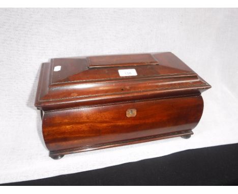 A 19TH CENTURY MAHOGANY TEA CADDY with fitted interior, 15" wide