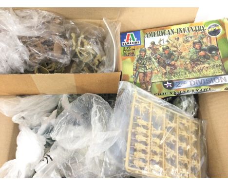 A Box Containing a Large Collection of small Plastic Model Kit Soldiers.
