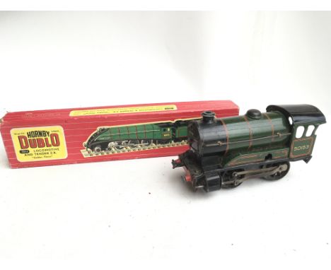 A Box Containing Model Railway items including a 00 Gauge Hornby Dublo Golden Fleece. Coaches. Track. And a 0 Gauge Locomotiv
