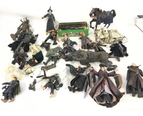 A large box containing in excess of 50 model action figures from the LORD OF THE RINGS series. Some active figures included p